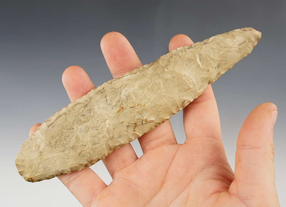 6 1/8" heavily patinated woodland culture Flint knife. Slight damage to tip area. Found in Illinois.