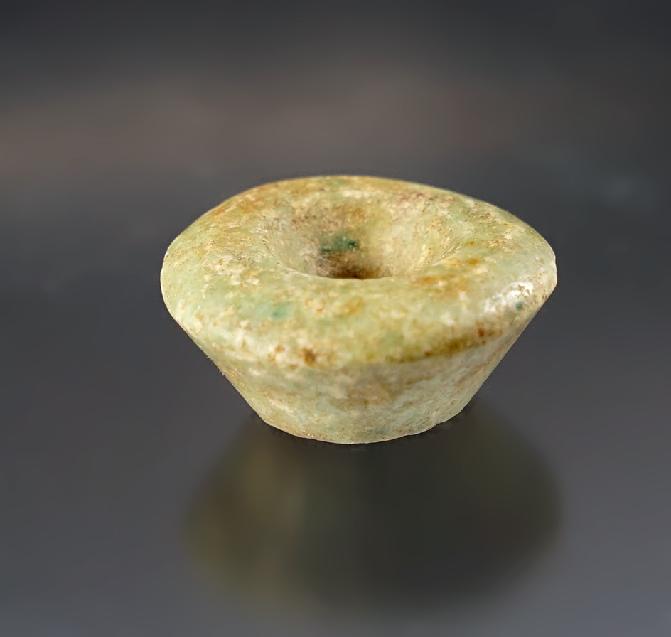 1" diameter by 7/16" tall polished Stone Ear Flare found in Colusa Co., California.