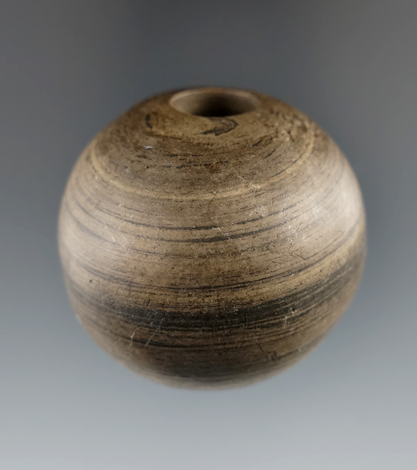 1 1/2" Archaic Fluted Ball Bannerstone found in Greene Co., Ohio. Ex. Frank Morast, David Walsh.