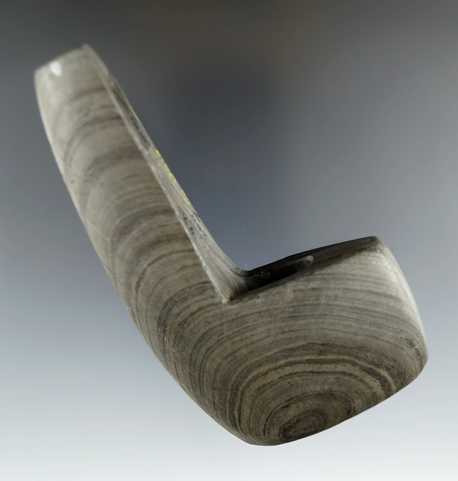 4" Archaic Geniculate made from green and black Banded Slate, found in Ohio. Ex. LaDow Johnston.