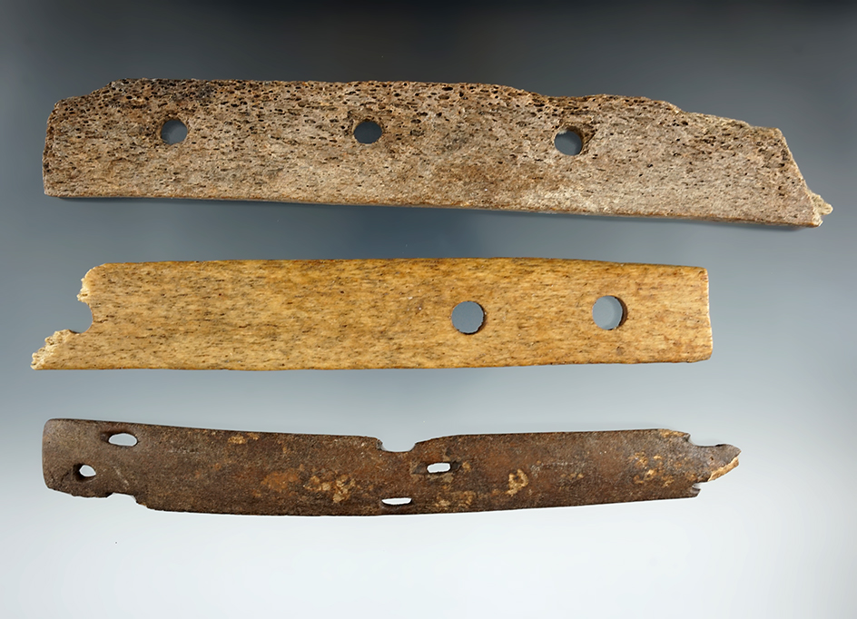 Set of three sections of Inuit bone armor, largest is 7 5/8".