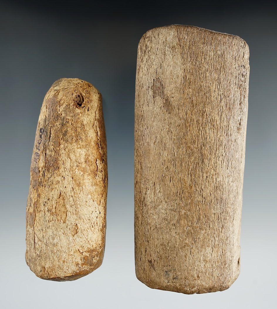 Pair of Inuit fishing weights made from whalebone found in Alaska, largest is 4 3/4".