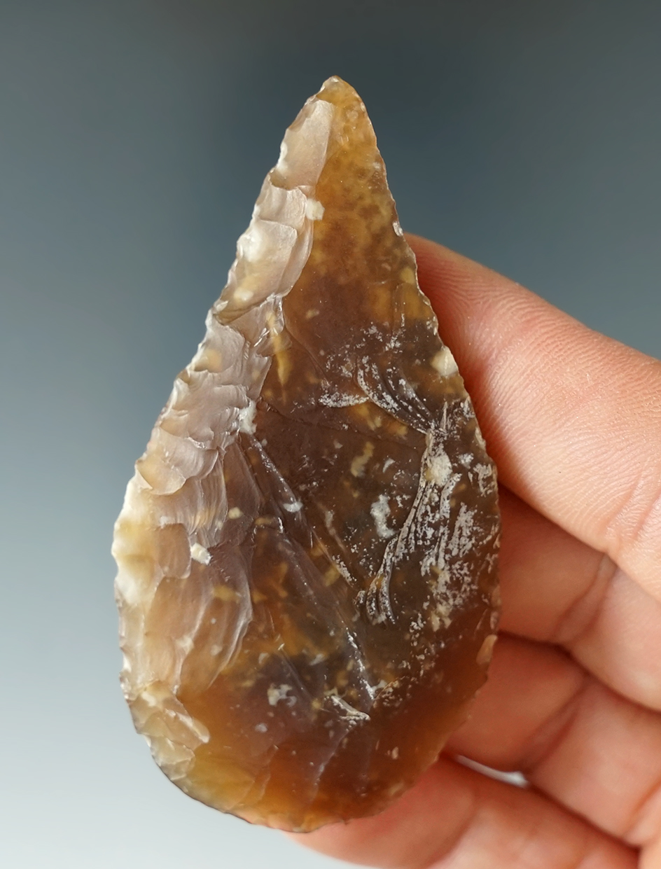 2 3/4" Cobbs beveled Knife made from Knife River Flint found in Eastern South Dakota.