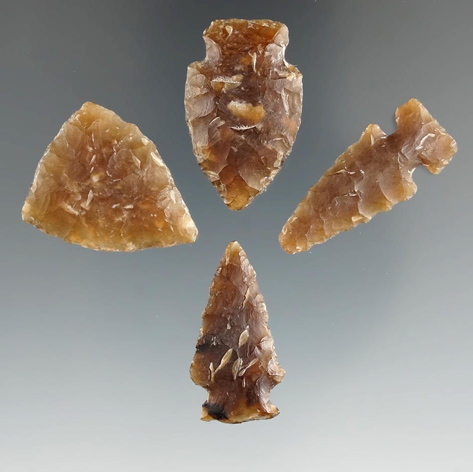 Set of four Knife River Flint arrowheads in nice condition found in Eastern South Dakota.