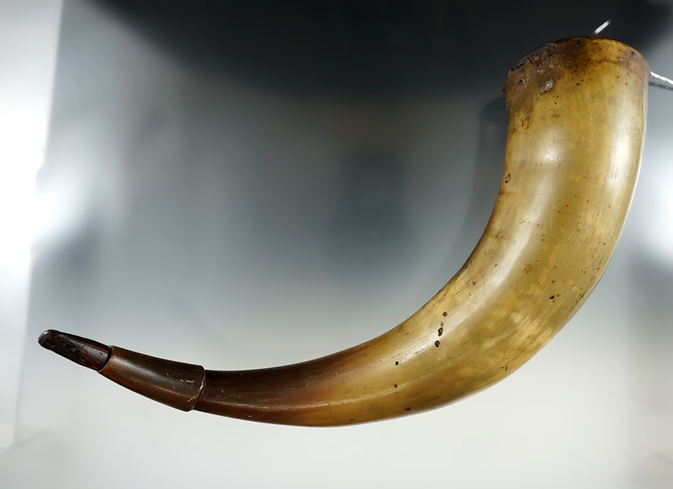 nicely styled 10 1/4" long antique Powder horn with original cap and plug.