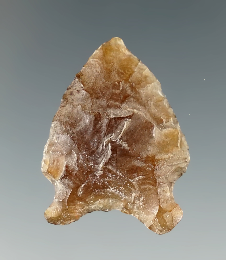 1 1/4" Oxbow that is very well patinated made from Knife River Flint found in Eastern South Dakota.