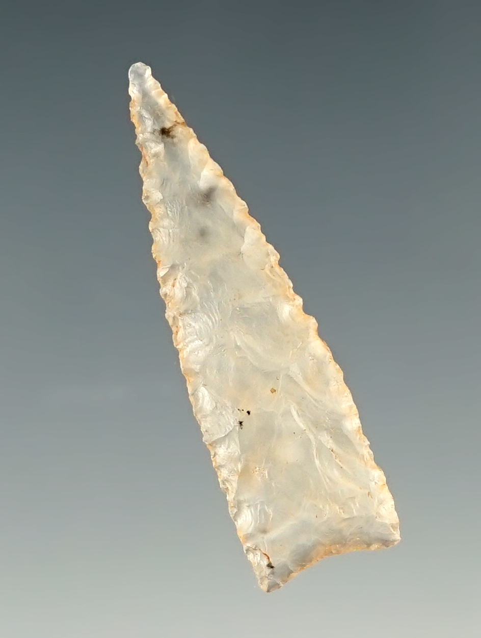 Exceptional! 1 9/16" triangular arrow point that is incredibly well flaked. Found in New Mexico.
