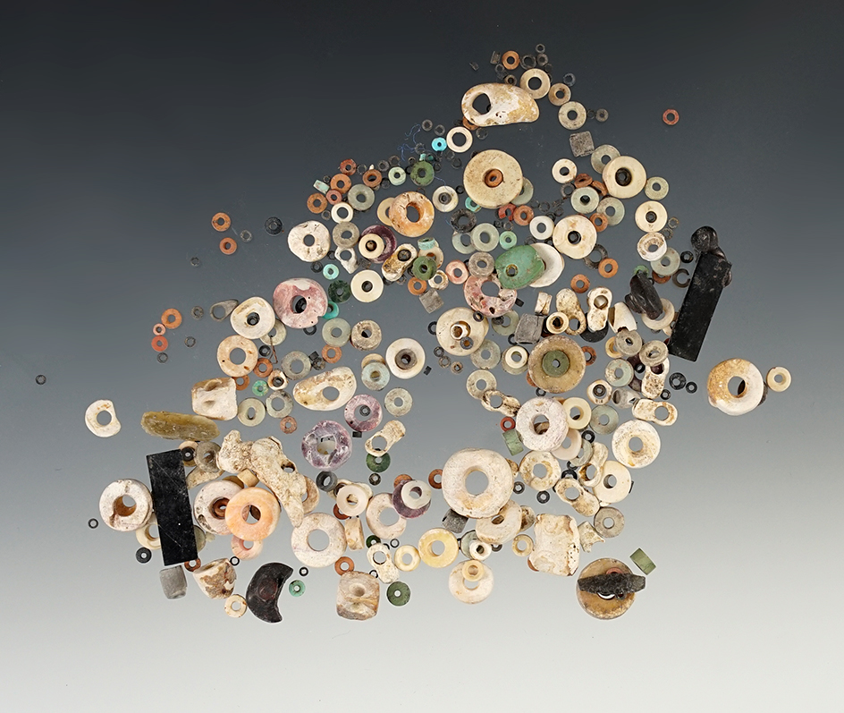 Large group of assorted drilled Shell Beads, found in New Mexico.