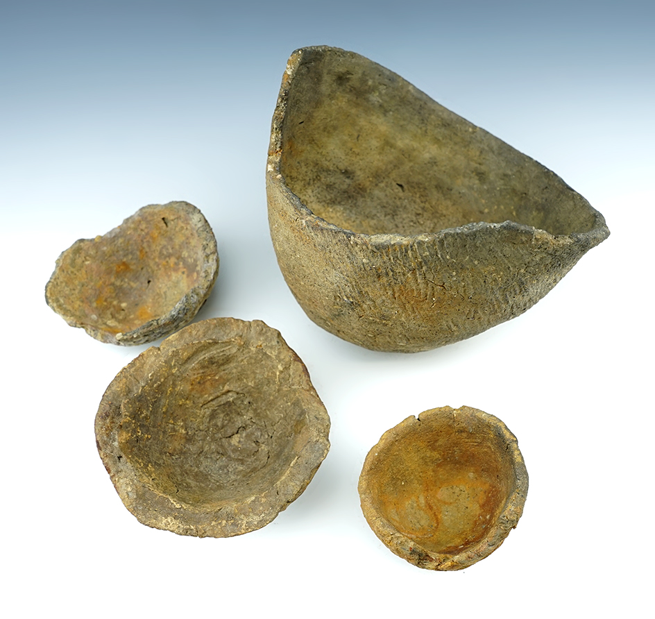 Set of four damaged pottery vessels found in the bay area of Maryland. Largest is 6 3/4".