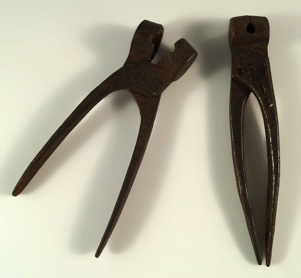 Two early bullet molds from the early 1800s in nice condition.