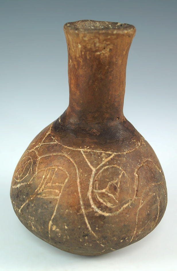 5" tall miniature Caddo water bottle with abstract engraving. Found in Cherokee Co., Texas.