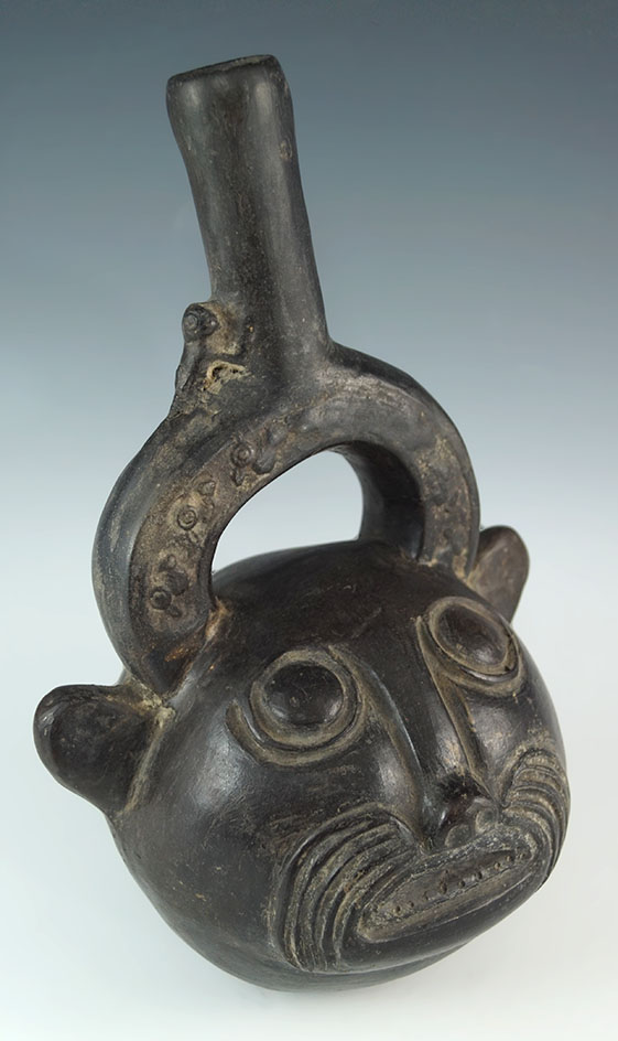 9" Chimu culture pottery vessel with a Mountain Lion recovered in Cusco, Peru.