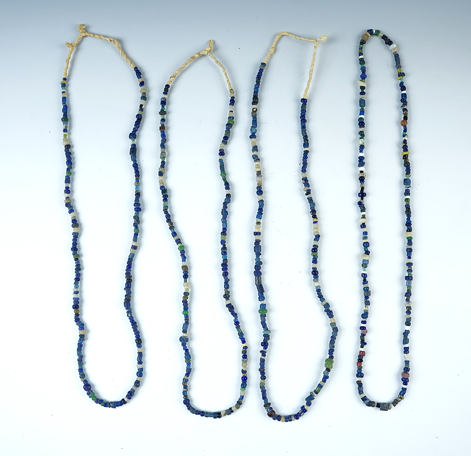 4 - 20" strands of assorted trade beads from a Cherokee Village Site,Tellico Plains, Monroe Co., TN. 