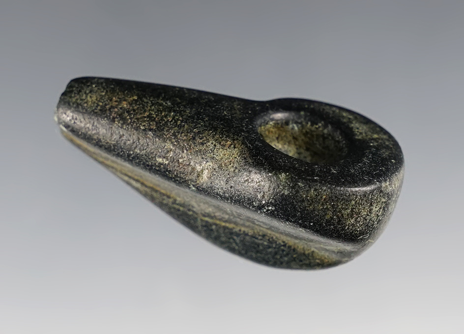 1 13/16" polished Stone Pipe with a uniquely styled keeled bottom. Found in Kentucky.