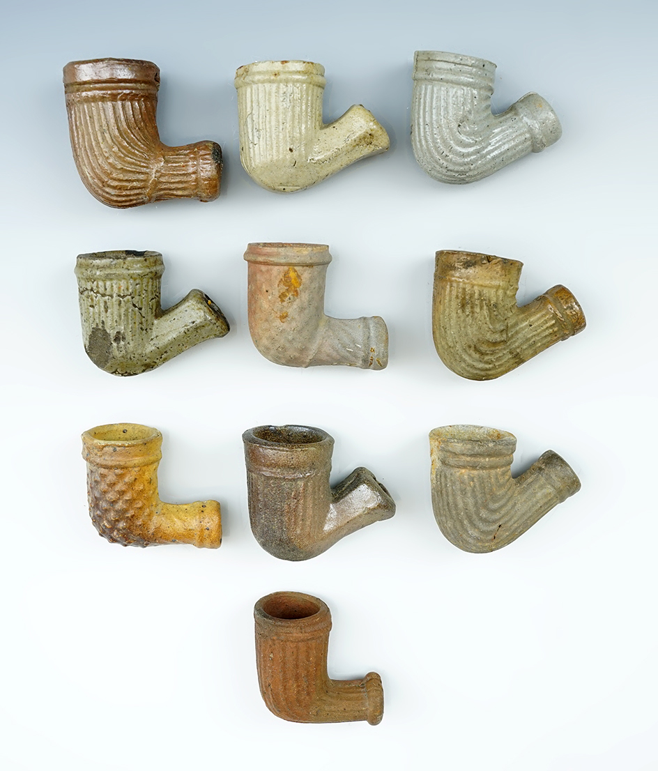 Group of 10 Assorted Clay Trade Pipes in nice condition.