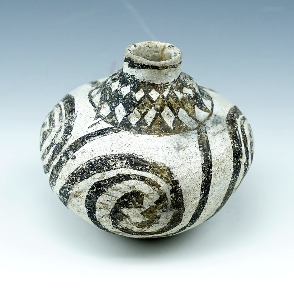 3 1/2" Miniature Anasazi Bottle that is nicely decorated and well styled. Found in New Mexico.