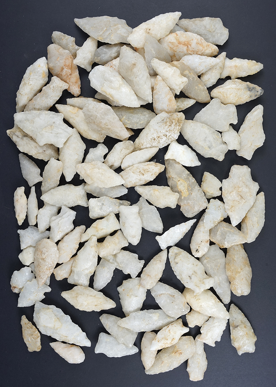 100 Quartz Arrowheads that were surface found in the Cecil Co., Maryland area. Largest is 2 3/8".