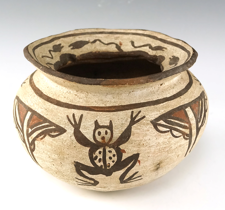 6" wide by 4 and 3" tall Zuni Pueblo flared rim pottery jar with nice artwork on exterior.