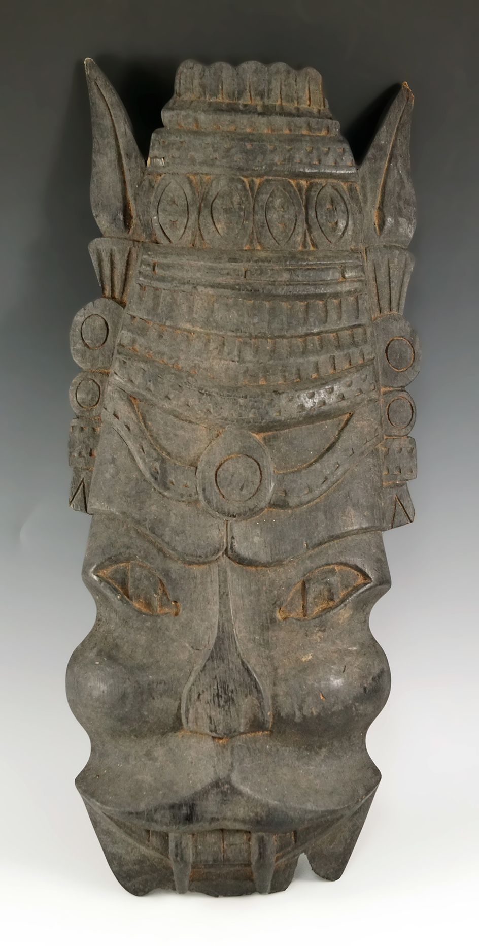 15" tall by 6 1/2" wide Asian wooden mask that makes a nice wall display item.