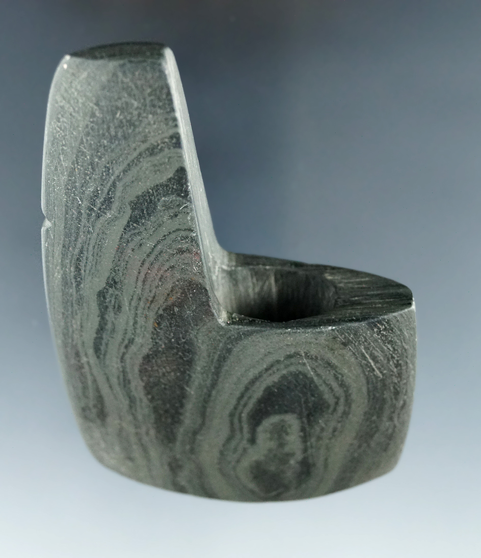 3 3/16" Archaic Geniculate made from green and black mottled slate, found in Allen Co., Ohio.