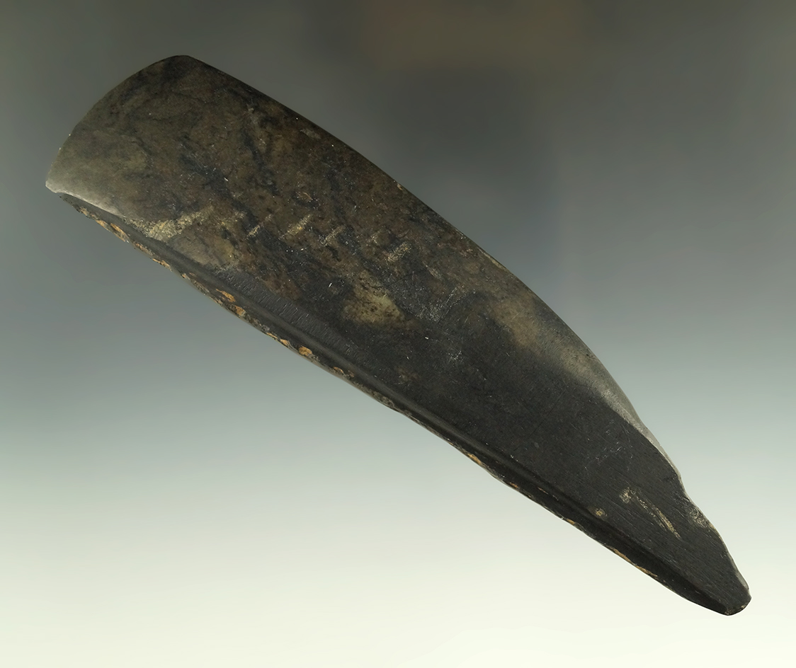 6 3/16" jadeite/nephrite Celt that is highly polished at the very sharp bit found in British Columbi