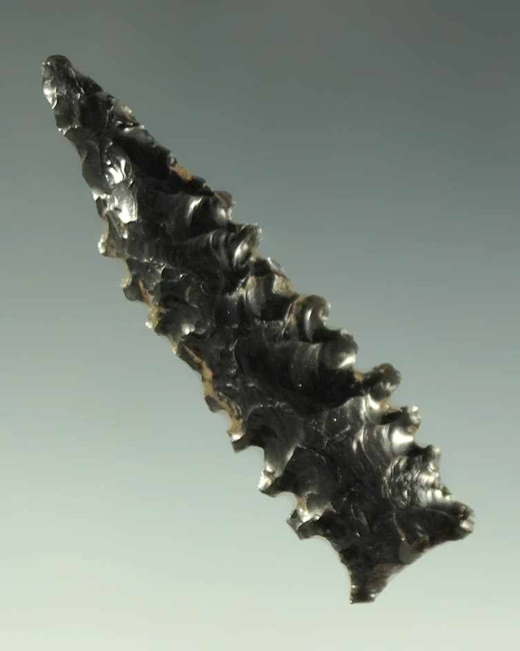Highly serrated 1 7/8" obsidian Stockton found in northern California.