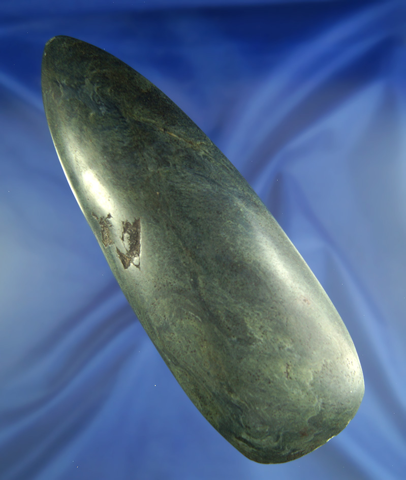 7 5/8" beautifully polished multicolored green Celt from Indonesia.