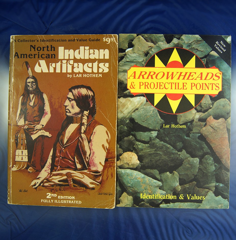 Pair of soft cover Lar Hothem books.