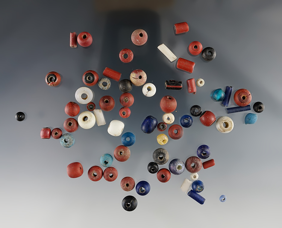 Group of 69 various types of trade beads including tubes, redwoods in barrels. Geneva, NY.