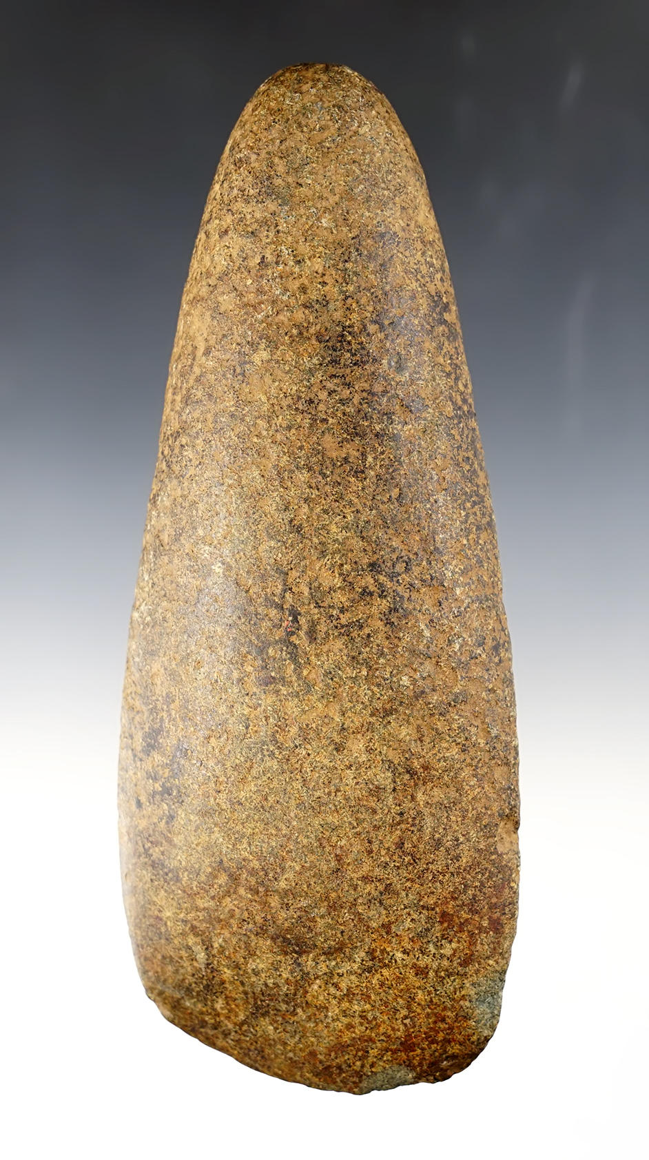 7 5/8" heavily patinated and well styled Ohio Hardstone Celt. Several dings to the bit.