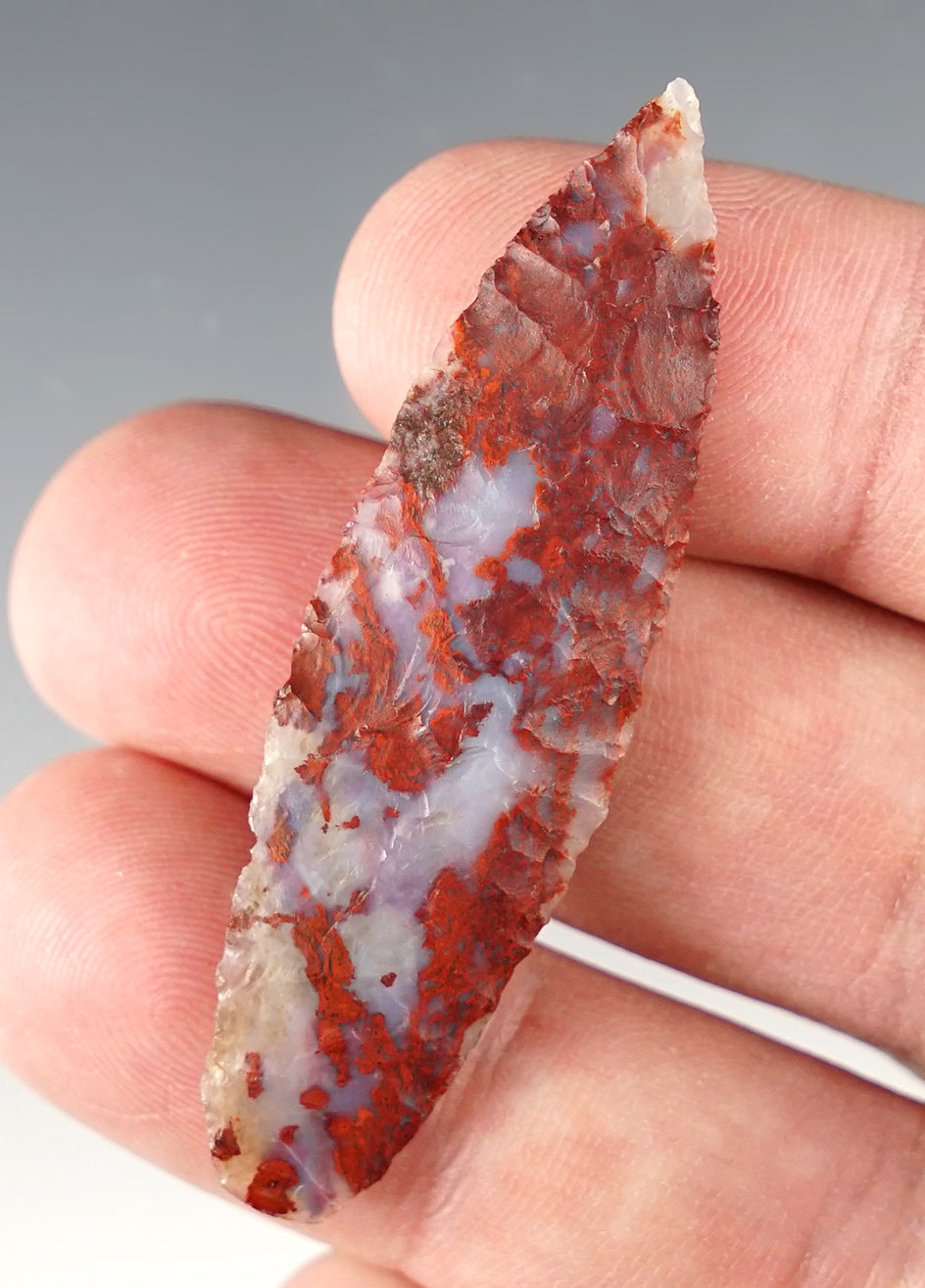 2 1/4" well flaked point made from beautiful clear blue and red Agate found in Colorado.