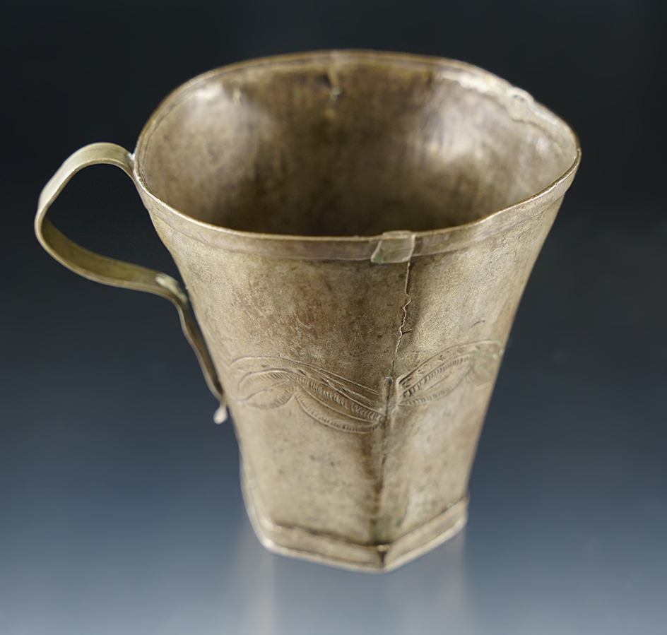 2 3/4" Early Spanish hand made cup with original handle and nice incised design.