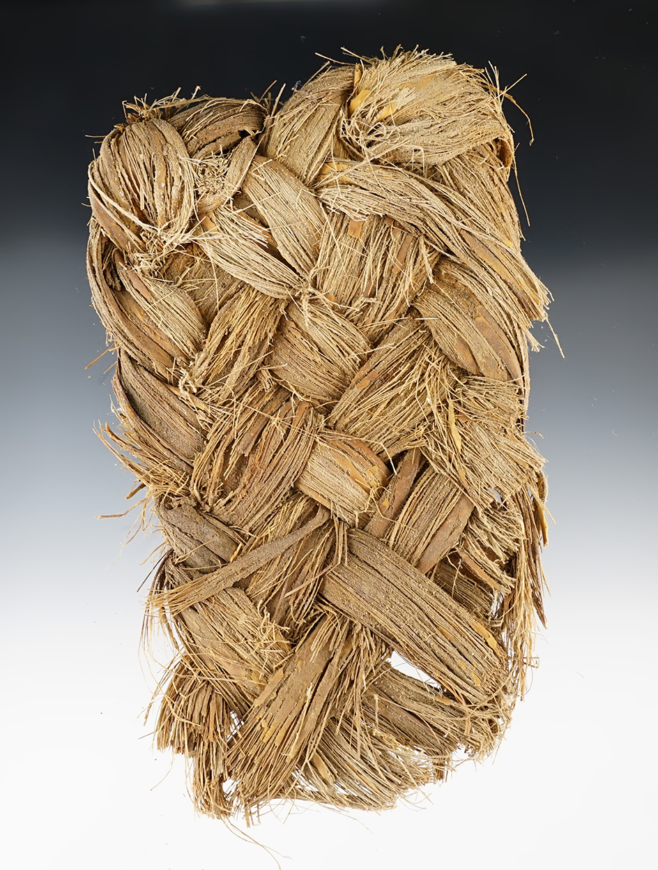 7 1 /4" long by 4 1/4" wide ancient woven plant fiber textile, New Mexico.