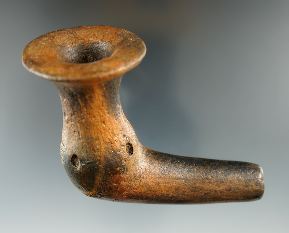 3 5/8" Iroquois clay trumpet pipe with restoration to part of the stem and elbow. New York.