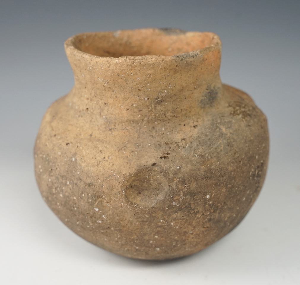 4 1/2" x 4 1/2" Mississippian pot with four unique indentions on body. Found in Arkansas.