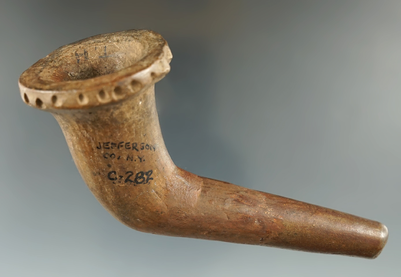 4 5/8" Iroquois clay trumpet pipe - Jefferson County New York - broken and mended elbow.
