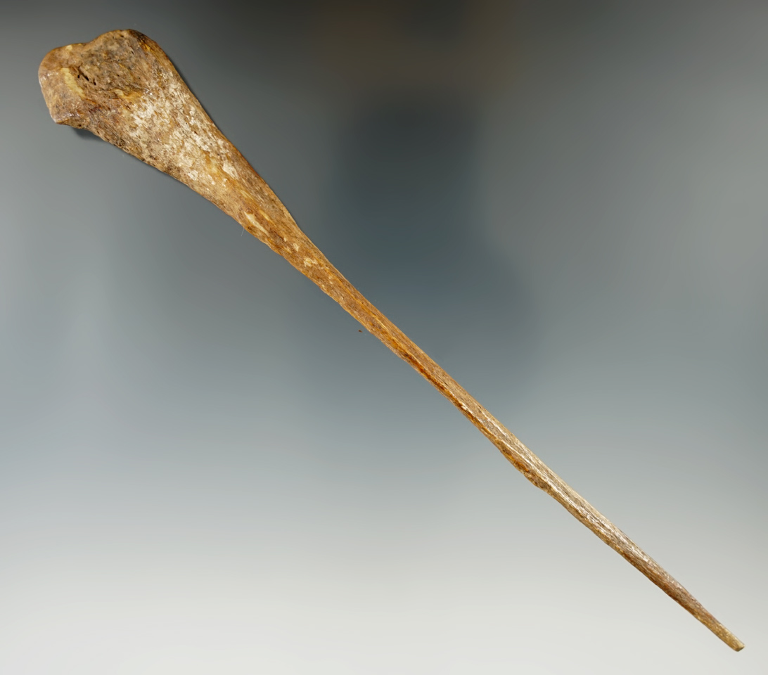 7 3/8" long and thin heavily patinated bone awl in excellent condition.