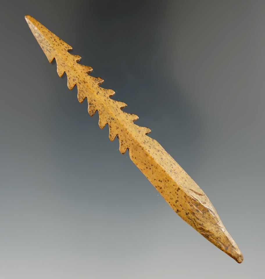 4 1/8" well-crafted serrated Inuit harpoon tip made from bone found in Alaska.