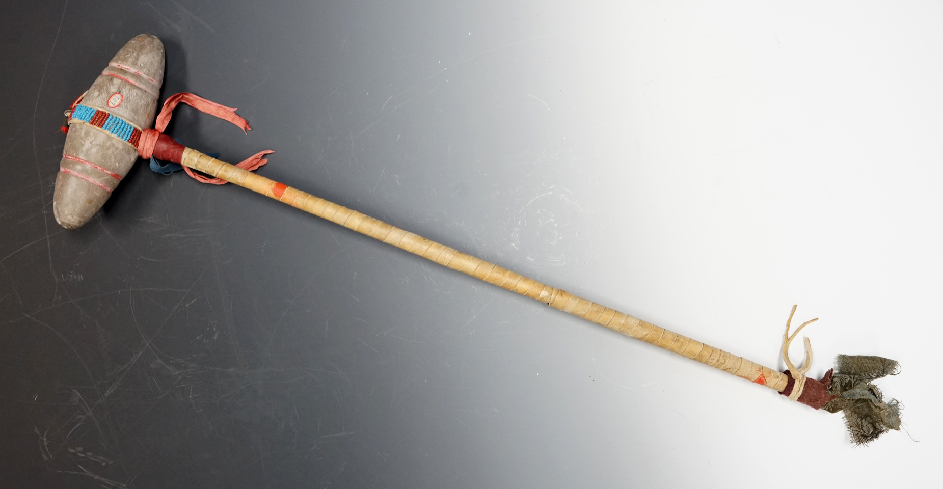 Circa late 1800's Plains Indian stone head club that measures 24" long in very nice condition.