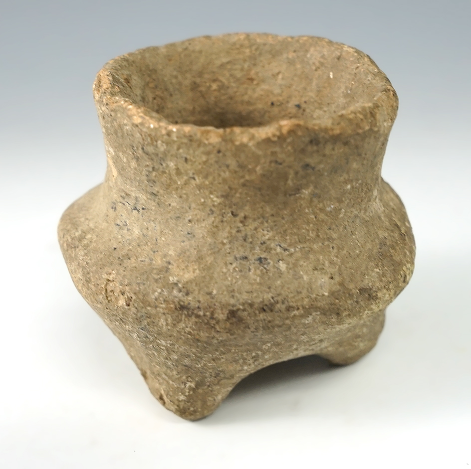 2 1/16" tall miniature tri-leg pottery vessel found in Arkansas.