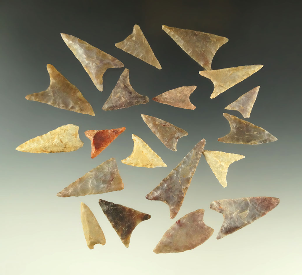 Set of 20 assorted Neolithic African arrowheads found in the northern Sahara desert region.