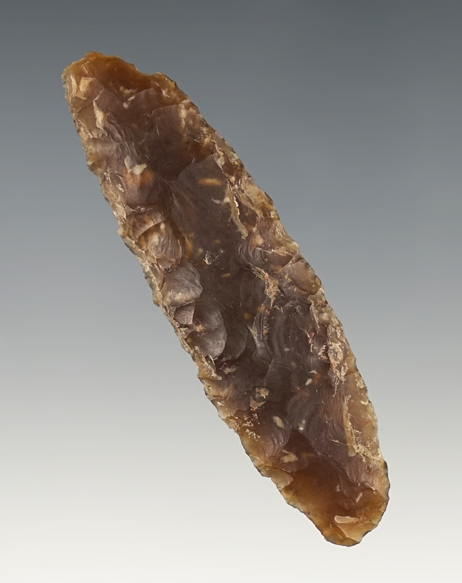 Nice 2 11/16" Paleo Knife found in South Dakota. Made from Knife River Flint.