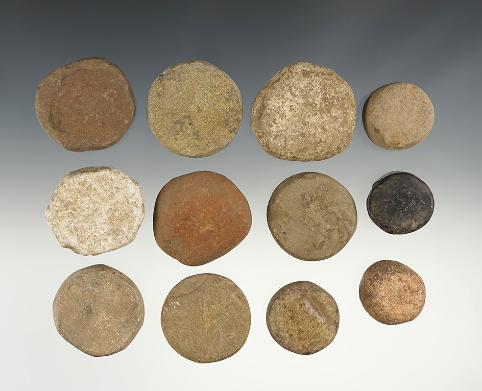 Set of 12 Stone Discs in nice condition. The largest is 1 1/2".