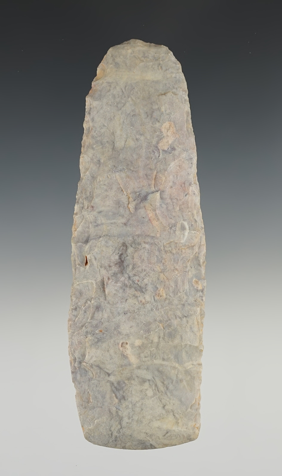 Colorful 5 9/16" African Neolithic Flint Celt found in the Sahara Desert.