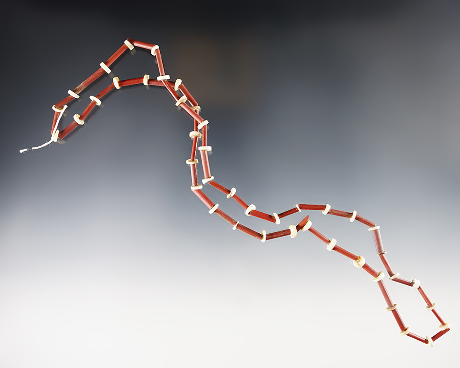 23" Strand of Red Straw Beads and Shell Discs. Found at the Power House Site in Lima, New York.