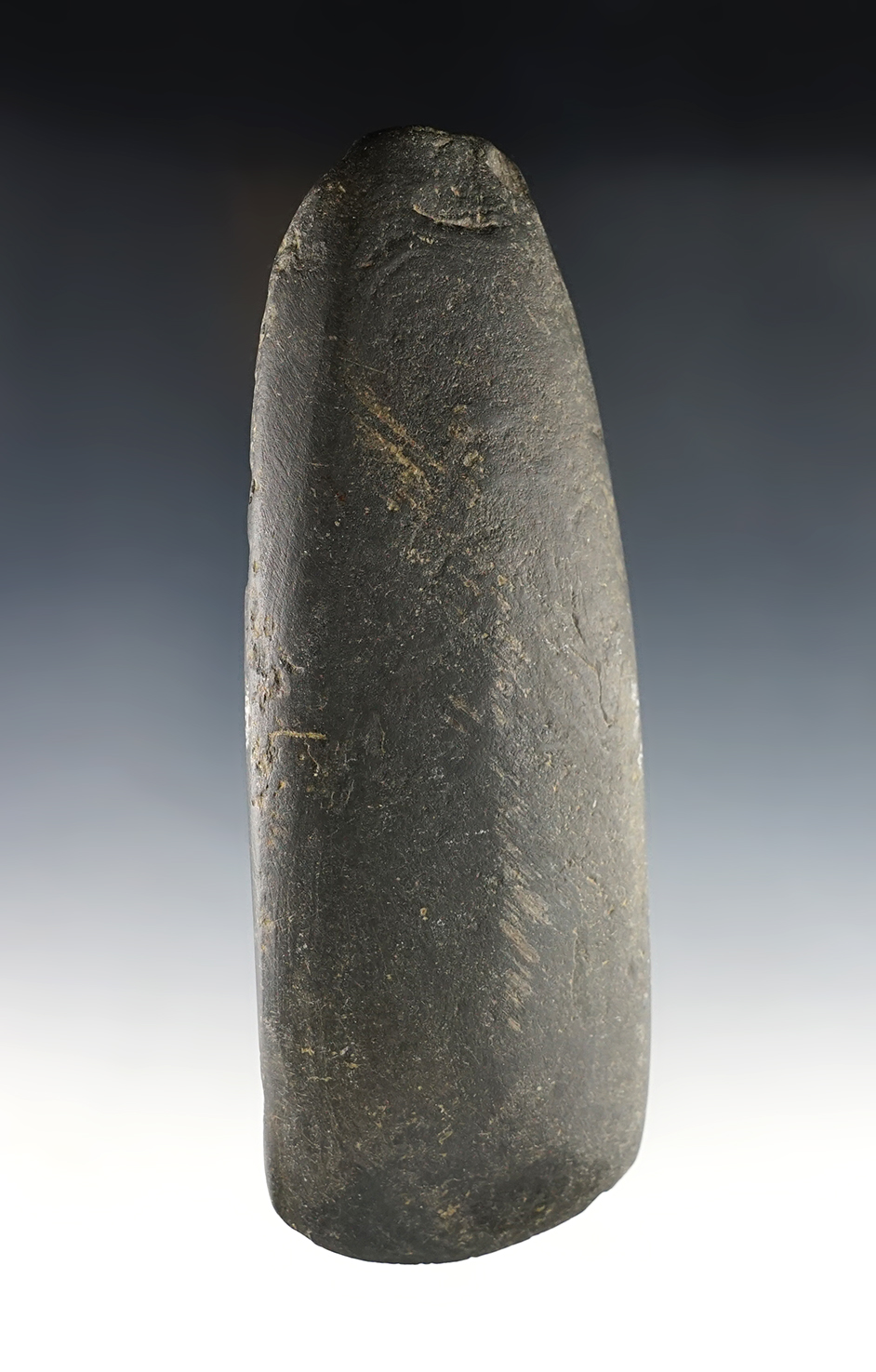 6 5/8" Ohio Celt made from Black Slate that is well patinated. 