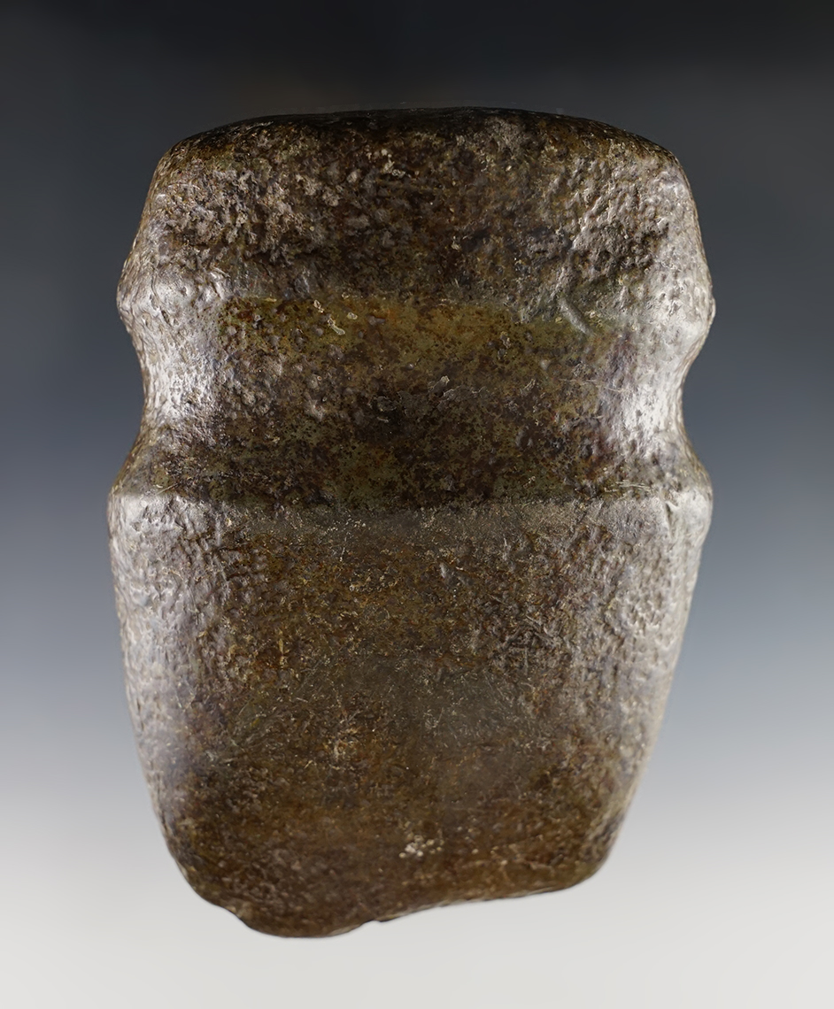 5 3/8" long Full Groove Axe found in the Midwest. Surface has been coated.