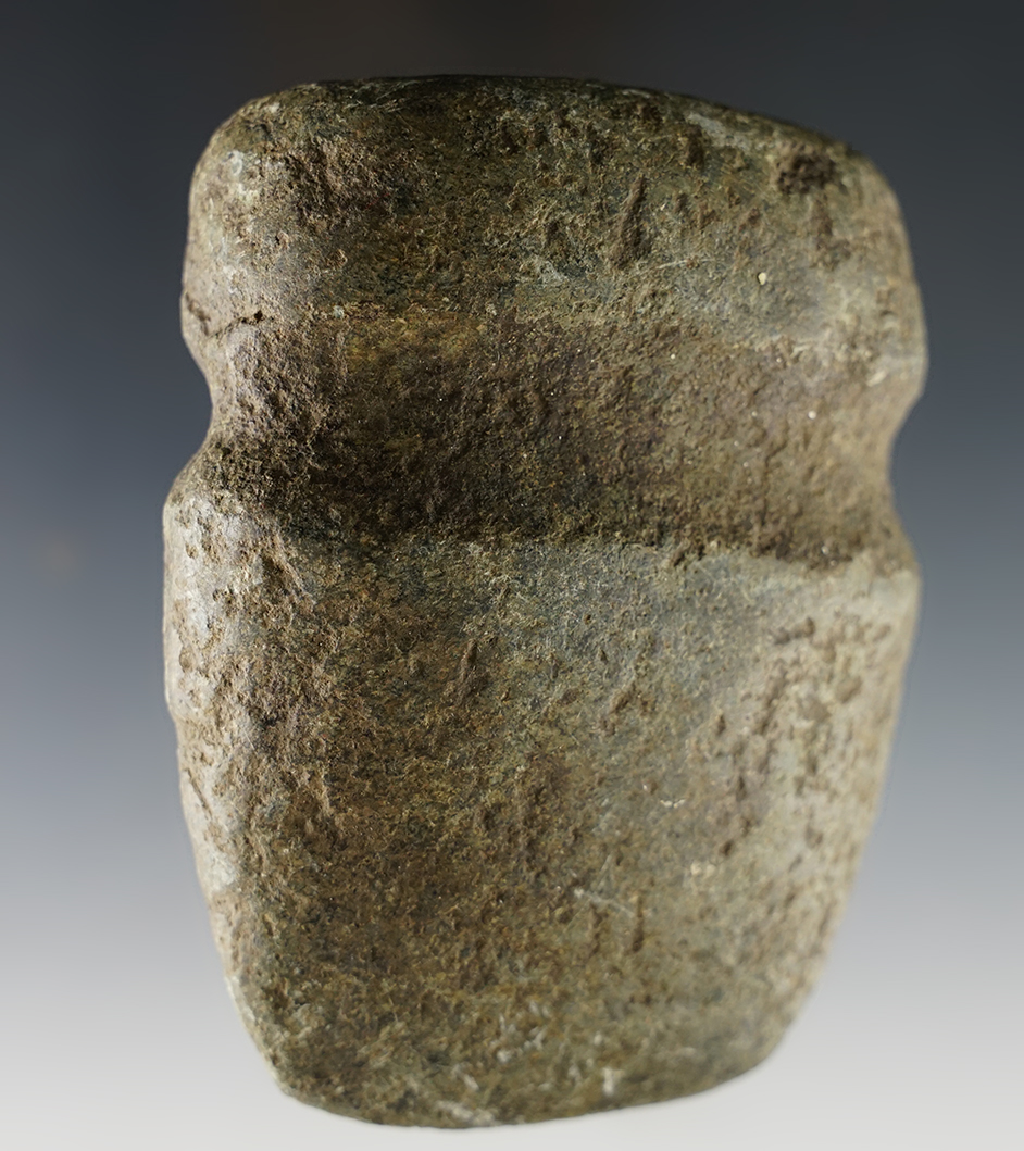 Heavily patinated 4" long Full Groove Axe made from green Hardstone. Found in Indiana.