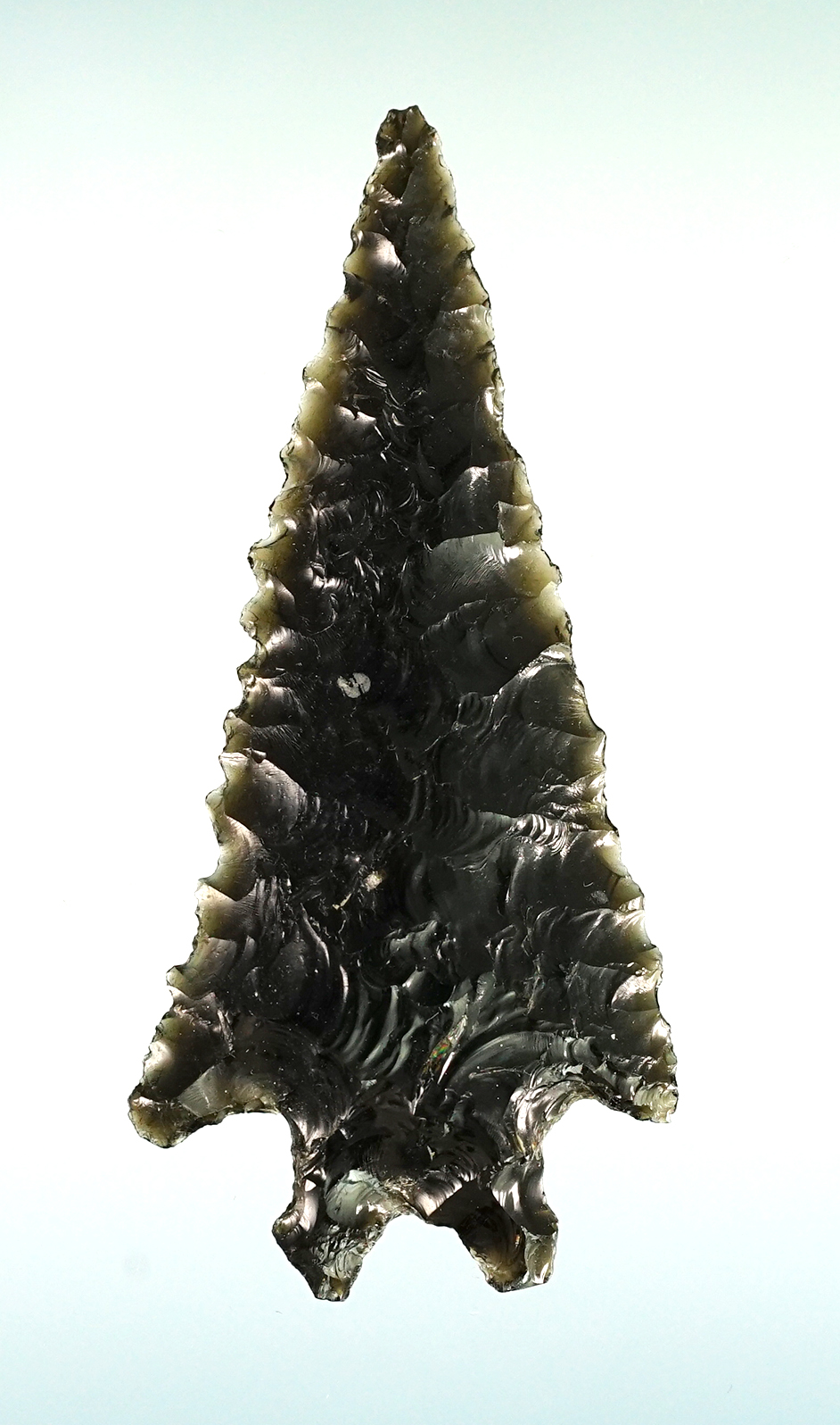 2 3/8" Pinto Basin made from obsidian in excellent condition. Very nicely flaked. Nevada.