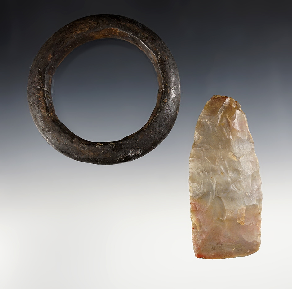 Pair of African Neolithic artifacts including a Stone Bracelet and a Flint Celt. The largest is 3 7/8".